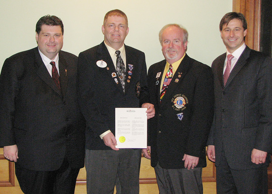 From left: Miramichi - Bay du Vin MLA Bill Fraser; Luke Stennick; current District Governor; Rod Wright, Vice District Governor for Lions Club District N1, and Graham. 